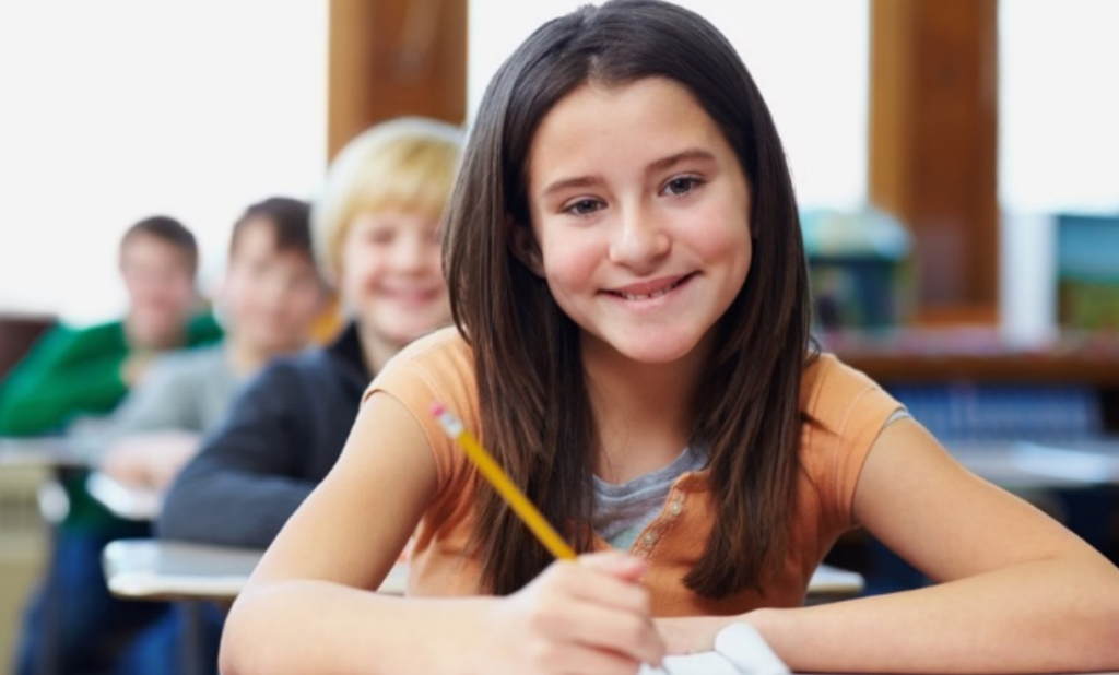 Meaning of Home girl with pencil at desk